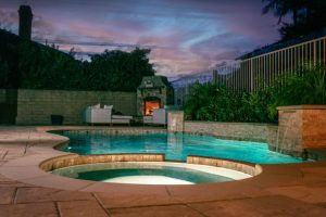 Outdoor Fireplace by pool